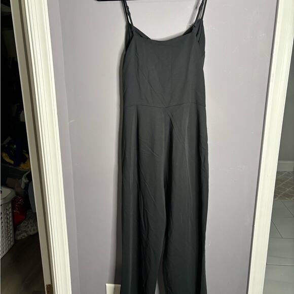 Lita Black Jumpsuit With Front Cutout & Bow Size Small - Picture 6 of 7